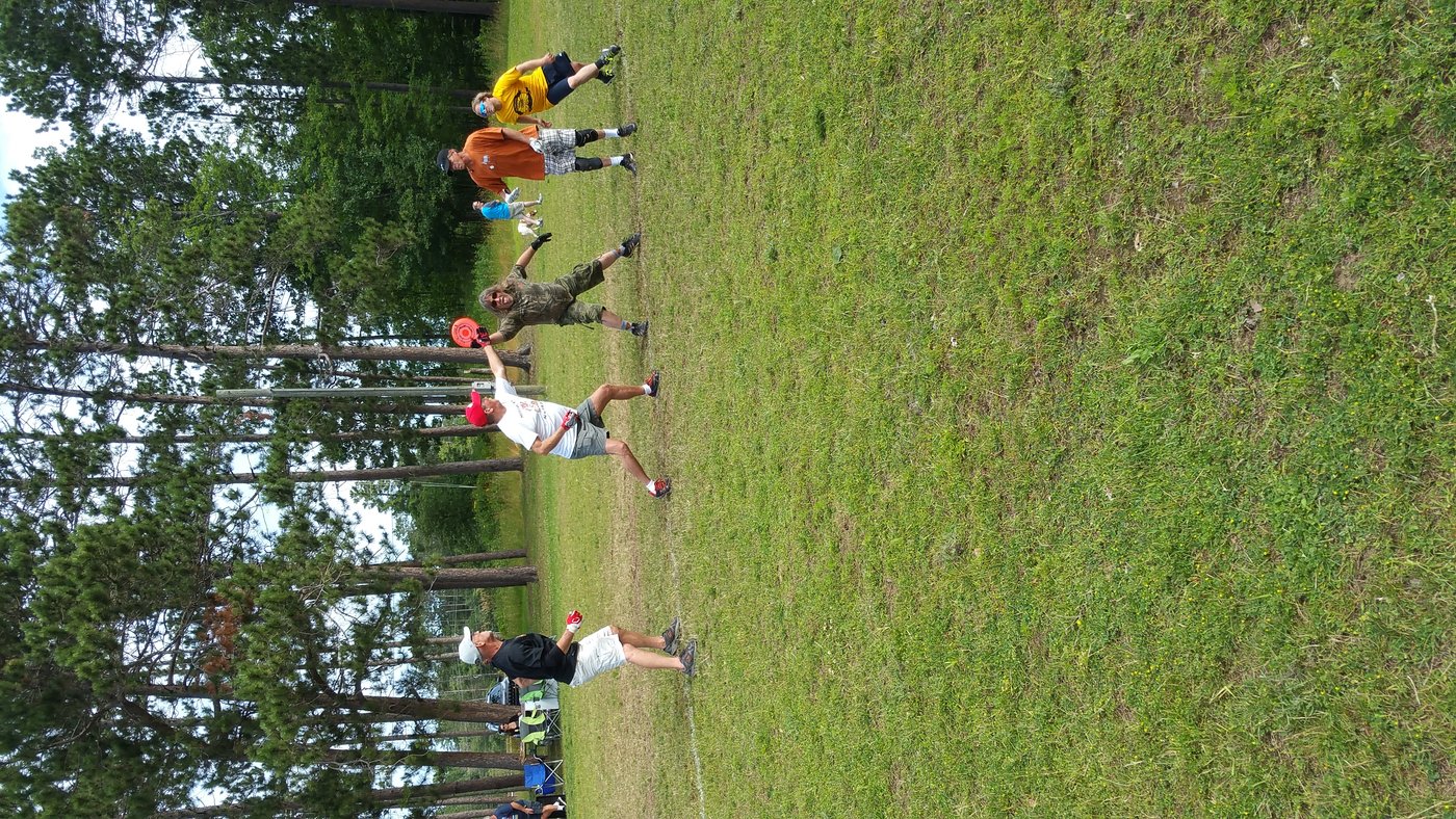 guts player reaching to catch a disc at the line