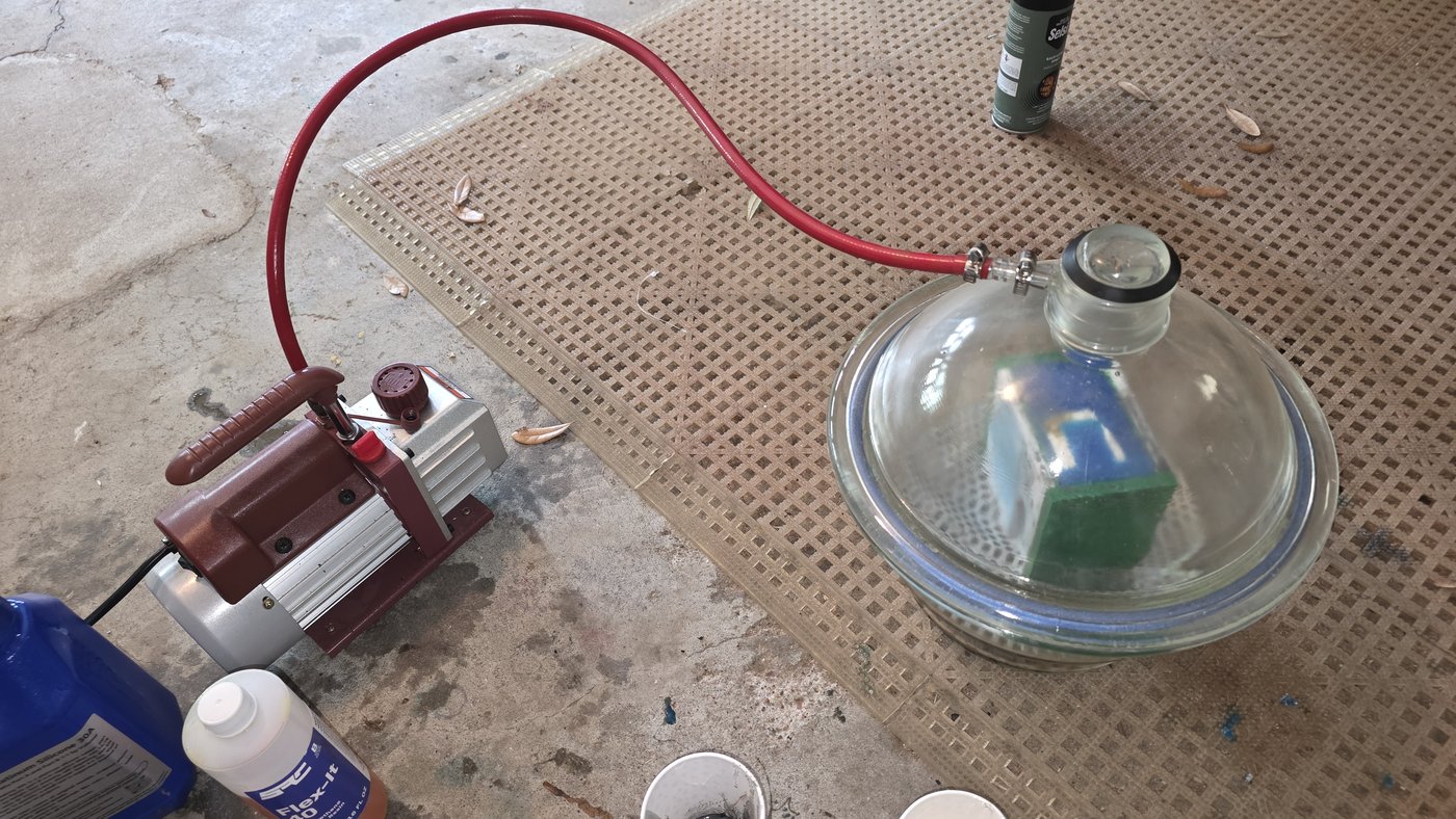 Platinum silicone under vacuum degassing before the mold cures